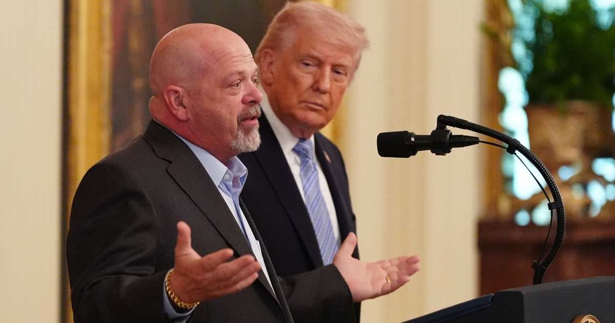 President Donald Trump listens as Rick Harrison speaks during an event with small business owners, Monday, May 4, 2026, in the East Room at the White House in Washington (AP Photo/Jacquelyn Martin)