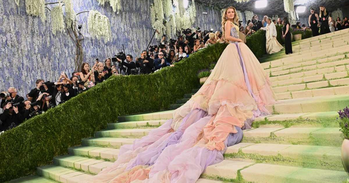Blake Lively said her gown, blending sunrise and sunset hues, symbolizes beauty, warmth, and the transition between the end of one day and the start of another (Evan Agostini/Invision/AP)
