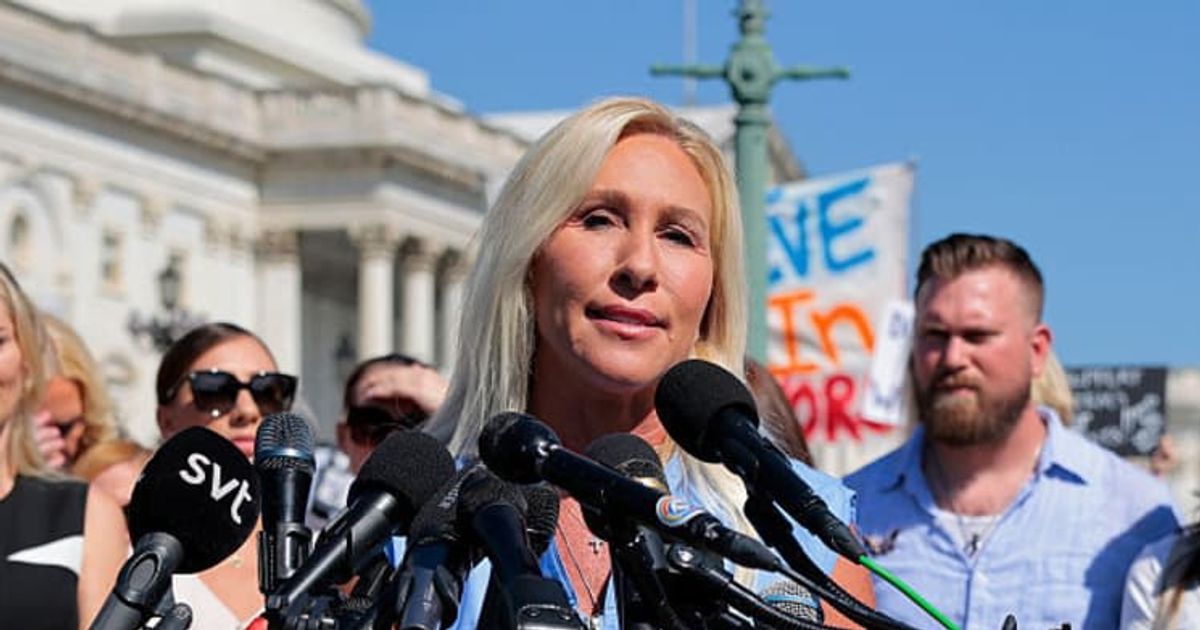 Marjorie Taylor Greene claimed Donald Trump sent texts blaming her as a 'traitor' and warning she could face jail for releasing them (Getty Images)
