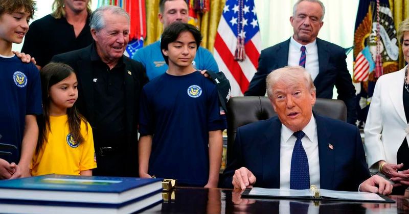 Trump launches rant against trans athletes while addressing children in Oval Office