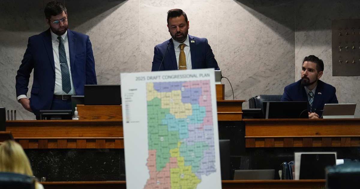 Indiana Lt Gov Micah Beckwith announces the results of a vote to redistrict the state's congressional map, December 11, 2025, at the Statehouse in Indianapolis (AP Photo/Michael Conroy, File)