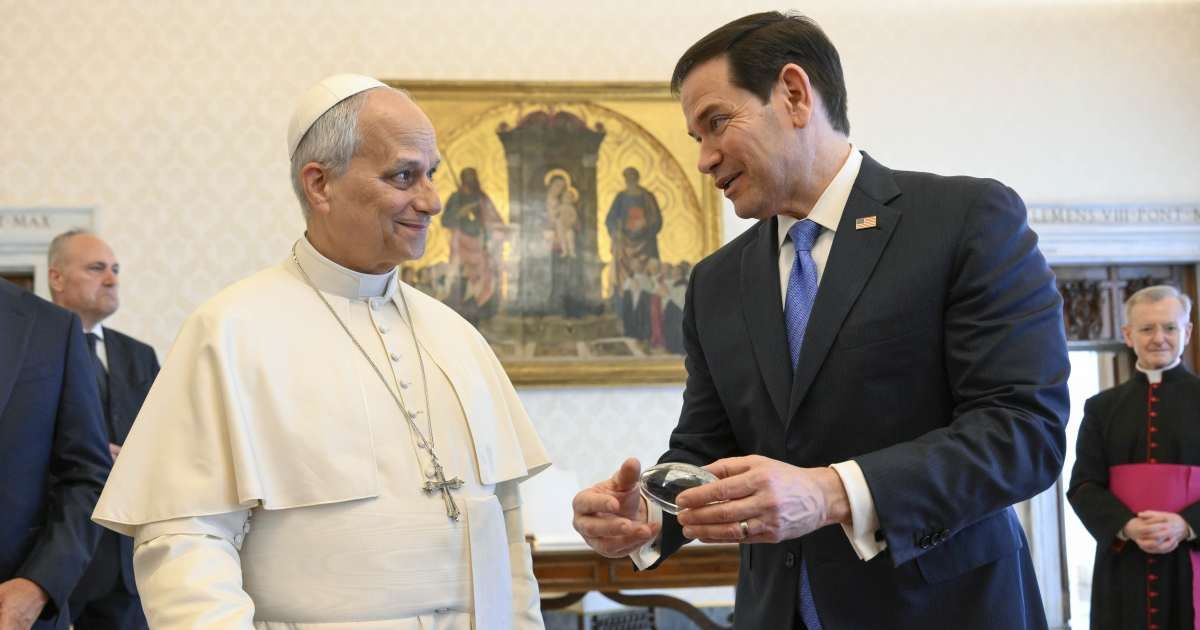 Pope Leo XIV exchanges gifts with Secretary Of State Marco Rubio during an audience at the Apostolic Palace on May 7, 2026, in Vatican City, Vatican (Simone Risoluti - Vatican Media via Vatican Pool/Getty Images)