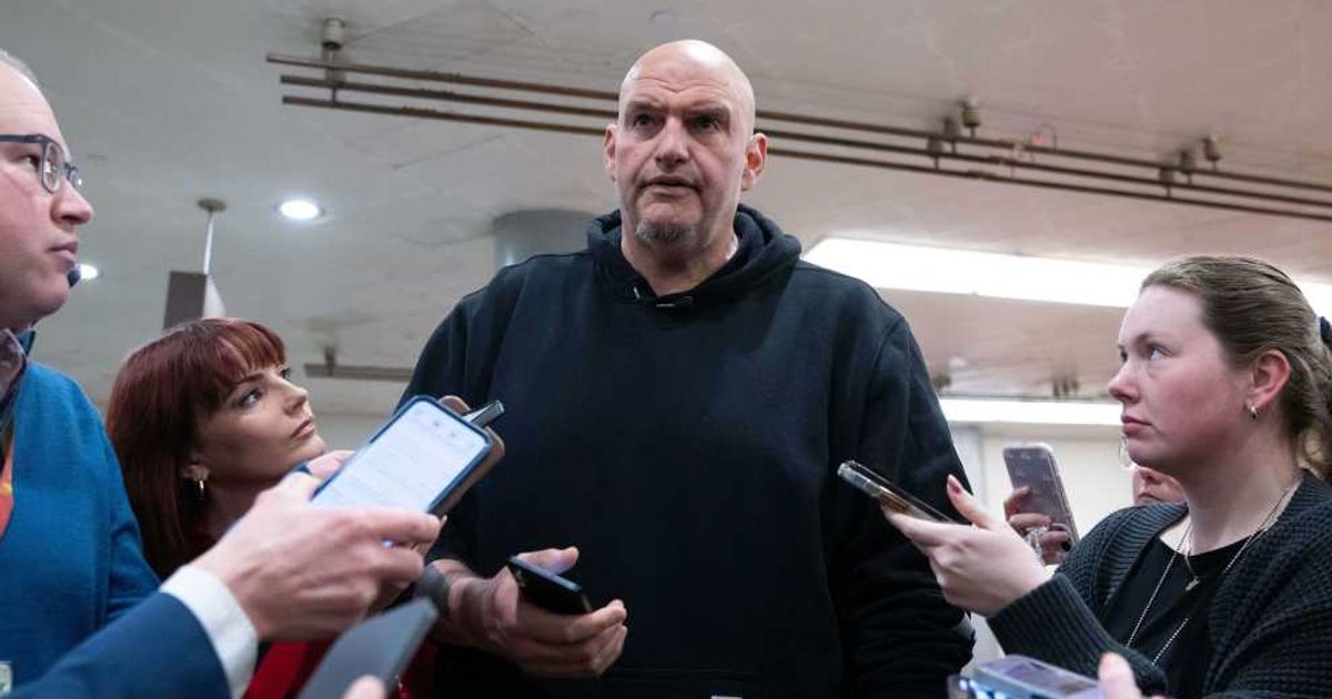 John Fetterman dismissed GOP recruitment rumors, saying he still votes overwhelmingly with Democrats (AP Photo/Allison Robbert)