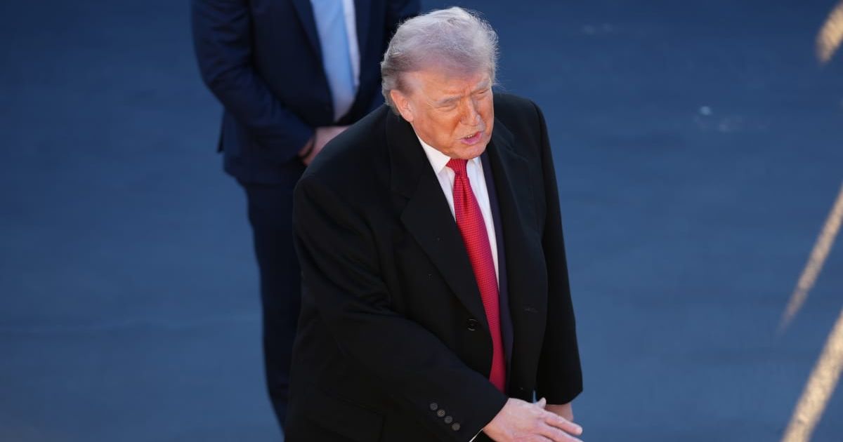 President Donald Trump talks as he visits the Lincoln Memorial Reflecting Pool to see the new blue protective coating being applied as part of a renovation project on Thursday, May 7, 2026, in Washington, DC (AP Photo/Mark Schiefelbein)