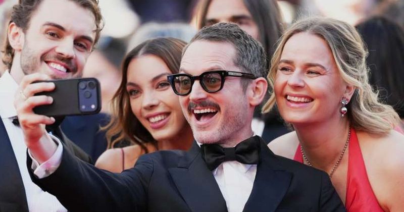 Elijah Wood breaks Cannes festival’s strict no-selfie red carpet rule
