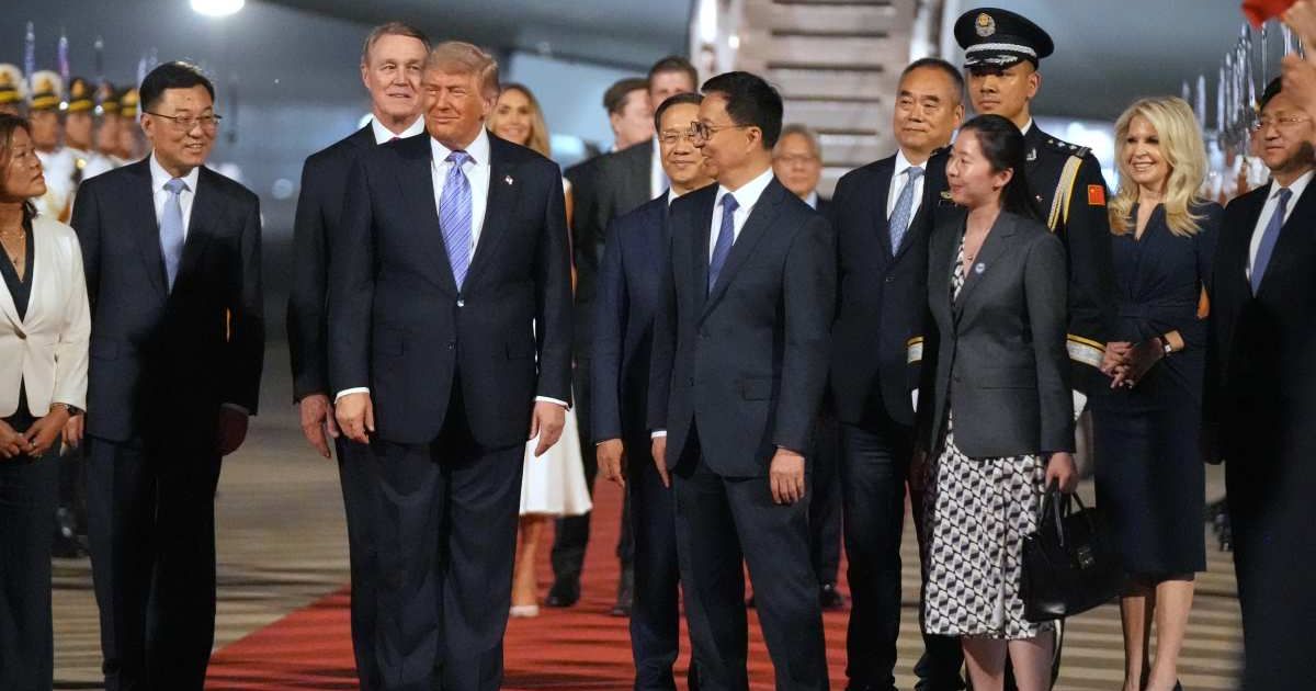 Trump pauses during a welcome ceremony after landing on Air Force One at Beijing Capital International Airport in Beijing on May 13, 2026 (AP Photo/Mark Schiefelbein)