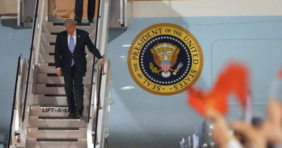 Donald Trump received a red-carpet welcome in Beijing as experts analyzed China’s choice of high-ranking officials at the airport (AP Photo/Mark Schiefelbein)