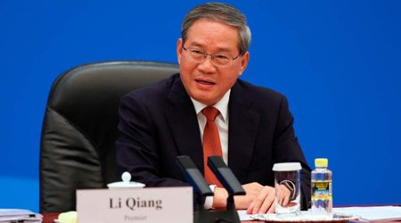 China's premier pitches Musk, Cook and Huang on investment as Beijing restricts their tech