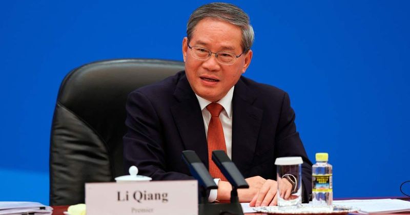 China's premier pitches Musk, Cook and Huang on investment as Beijing restricts their tech