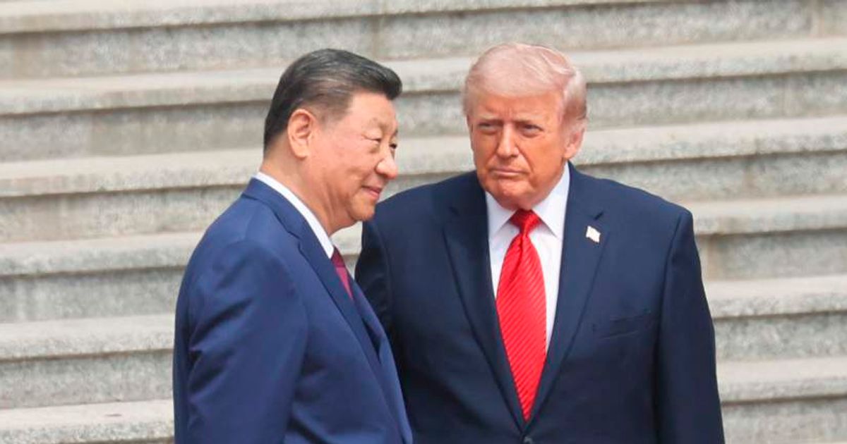 Chinese President Xi Jinping stood alongside President Donald Trump during a welcome ceremony at the Great Hall of the People in Beijing on May 14, 2026 (Maxim Shemetov/Pool Photo via AP)