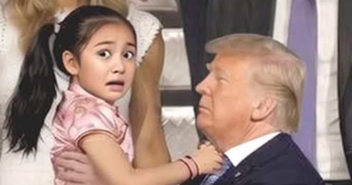 A widely circulated image claiming to show US President Donald Trump holding a visibly frightened young girl during his recent visit to China has sparked debate online (@SpencerHakimian/X)