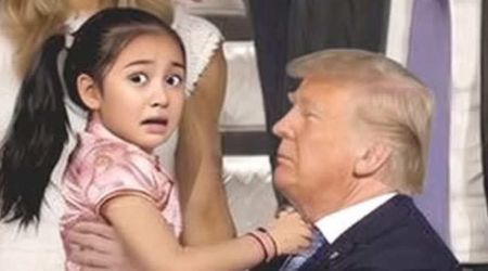 Fact Check: Is the image of Trump holding a 'terrified young girl' during his China visit real?