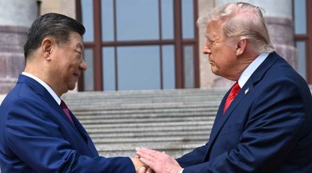 Trump and Xi swap roses in Beijing even as US-China tensions deepen anyway