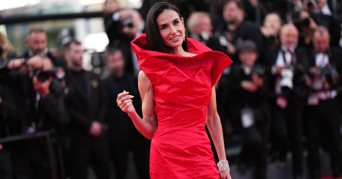 Jury member Demi Moore poses for photographers upon arrival at the premiere of the film 'Fatherland' at the 79th international film festival, Cannes, southern France, Thursday, May 14, 2026 (Scott A Garfitt/Invision/AP)