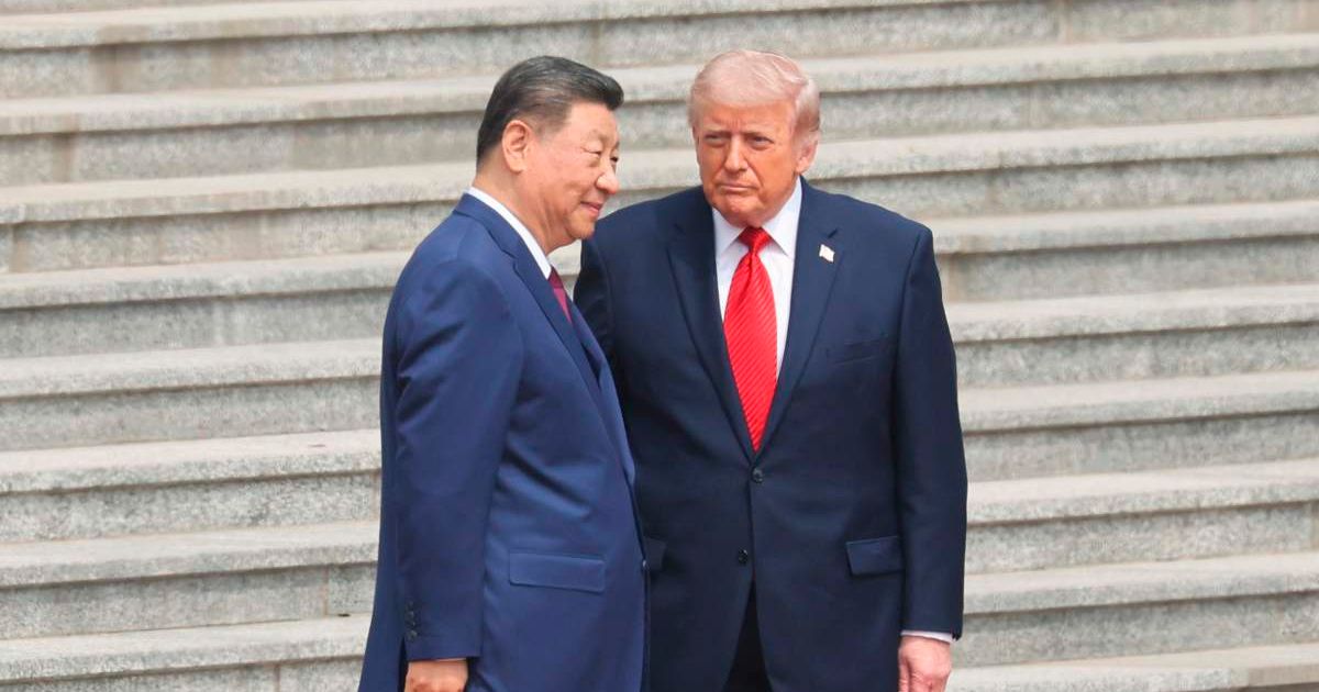 Chinese President Xi Jinping stood beside President Donald Trump during a welcome ceremony at the Great Hall of the People in Beijing on May 14, 2026 (Maxim Shemetov/Pool Photo via AP)