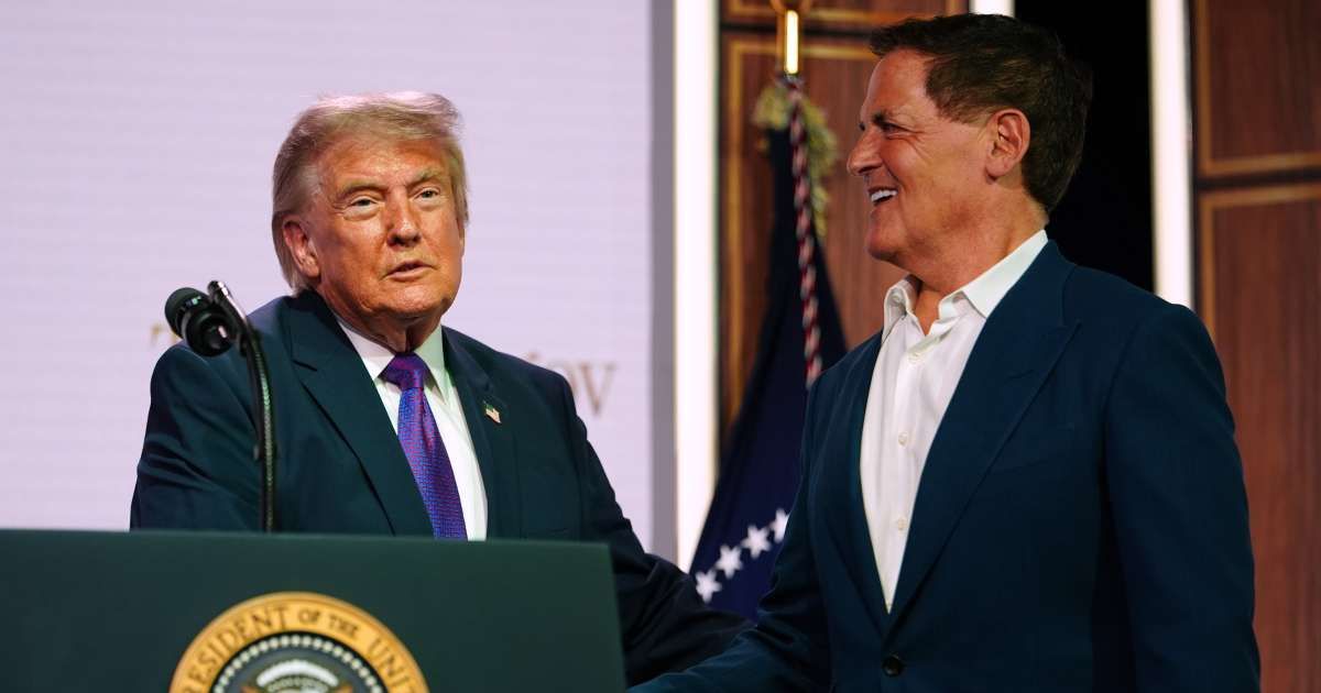 President Donald Trump and billionaire Mark Cuban set aside past political differences as they appeared together at the White House (AP Photo)