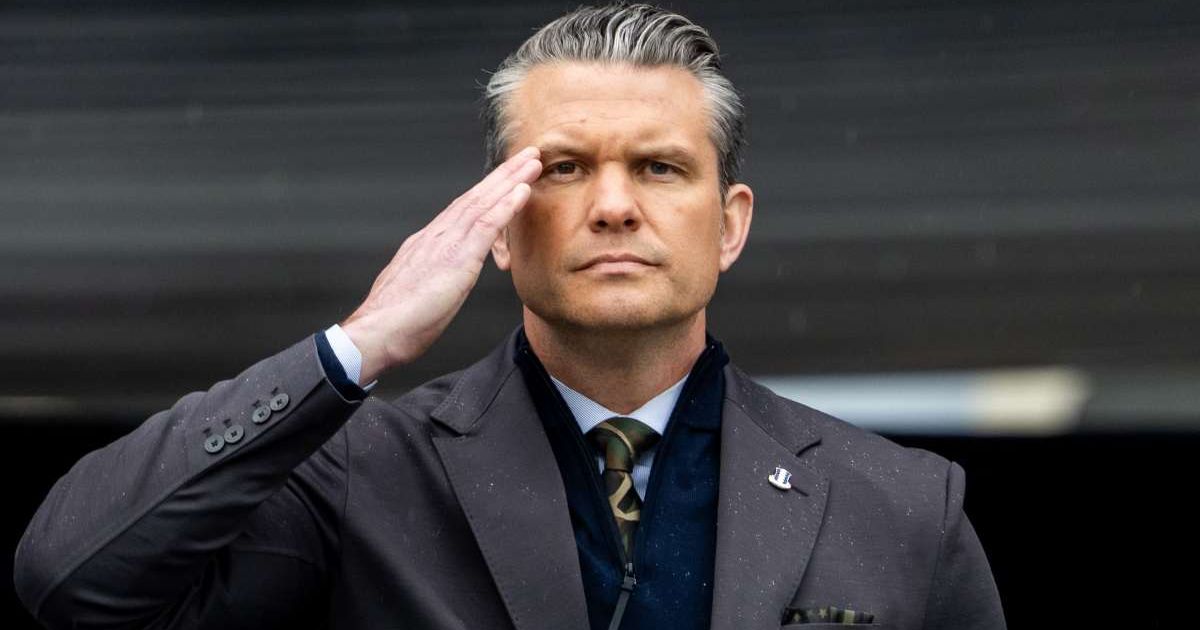 Secretary of War Pete Hegseth salutes graduating cadets during the United States Military Academy commencement ceremony in Michie Stadium at the US Military Academy on May 23, 2026, in West Point, New York (Adam Gray/Getty Images)