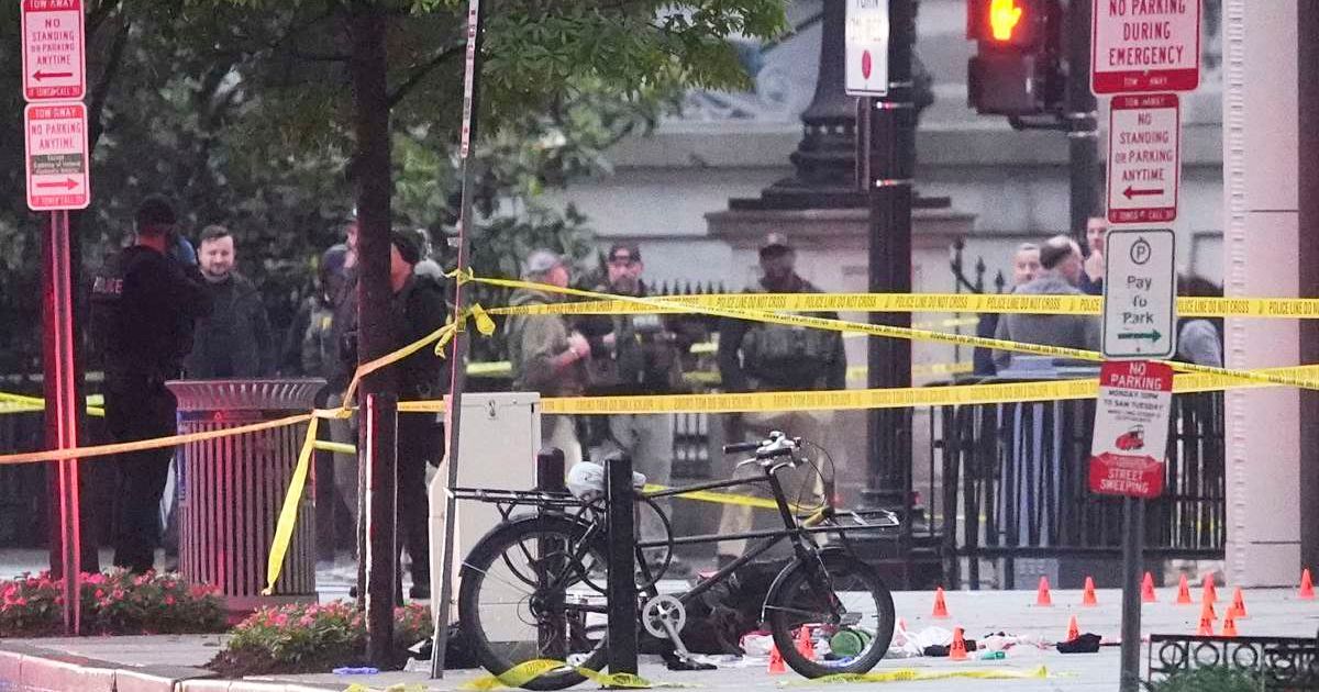 Secret Service agents moved quickly after gunfire was reported close to the White House on Saturday evening (AP Photo/Alex Brandon)