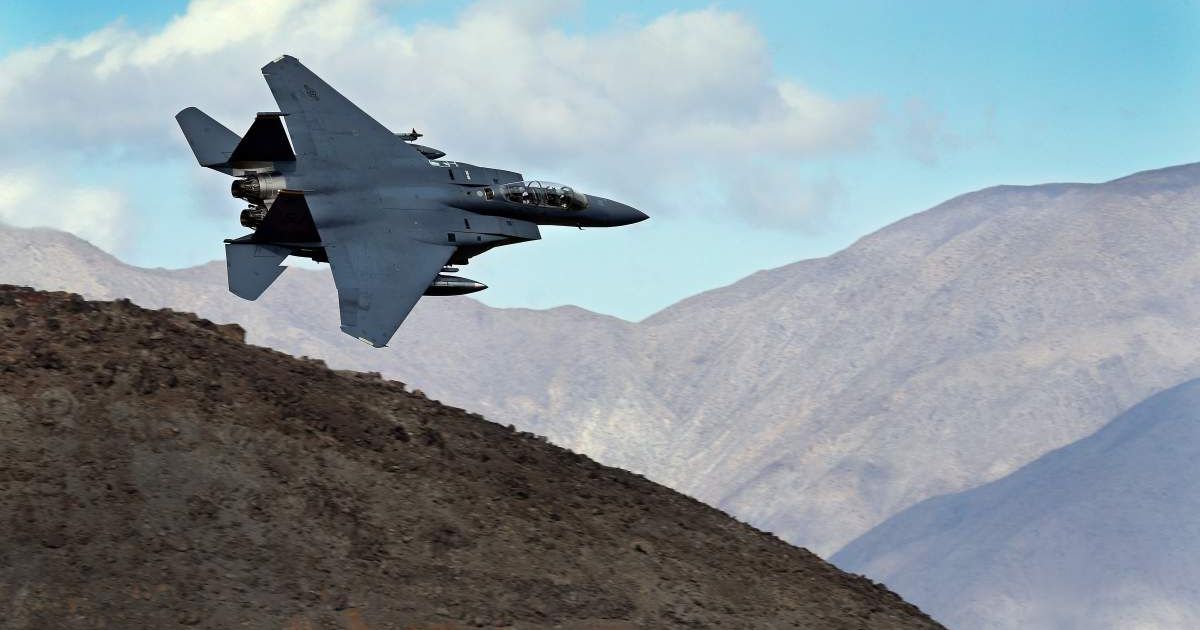 An F-15E Strike Eagle flies over Death Valley National Park, Calif., near the Panamint Range on February 27, 2017 (AP Photo/Ben Margot, File)
