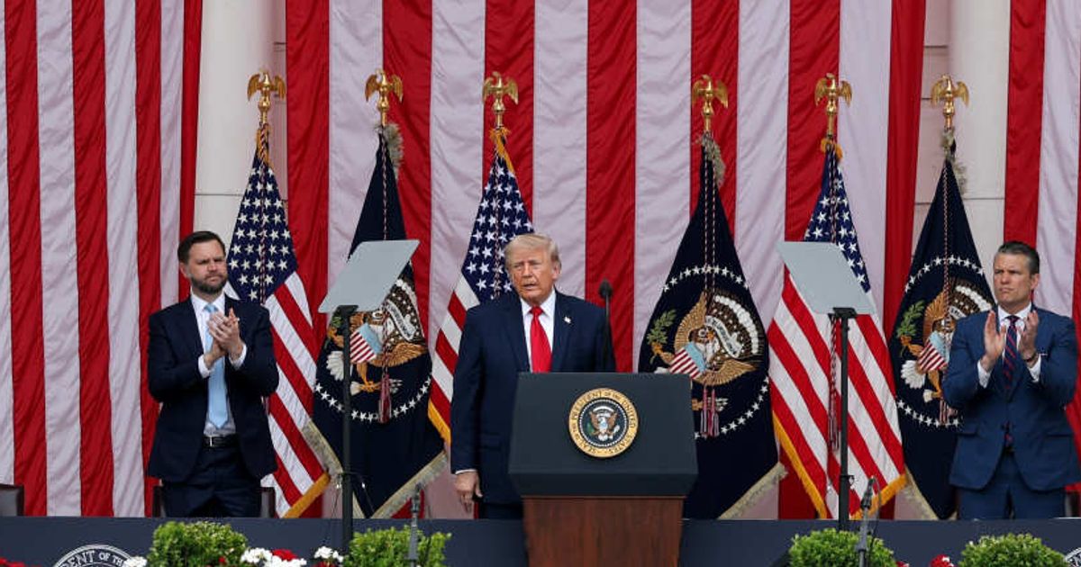 President Donald Trump delivers remarks with Vice President JD Vance and Secretary of War Pete Hegseth during a Memorial Day ceremony at Arlington National Cemetery on May 25, 2026, in Arlington, Virginia (Getty Images)