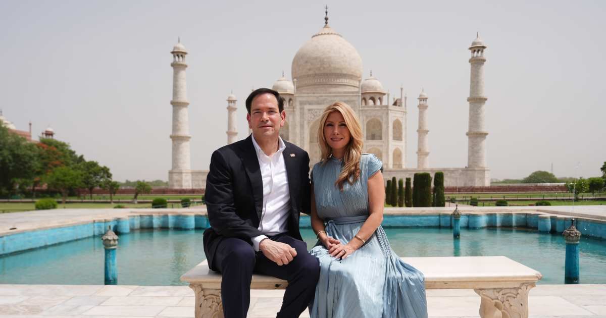 Secretary of State Marco Rubio poses with his wife Jeanette Rubio during a visit to the Taj Mahal in Agra, India, Monday, May 25, 2026 (AP Photo/Julia Demaree Nikhinson, Pool)
