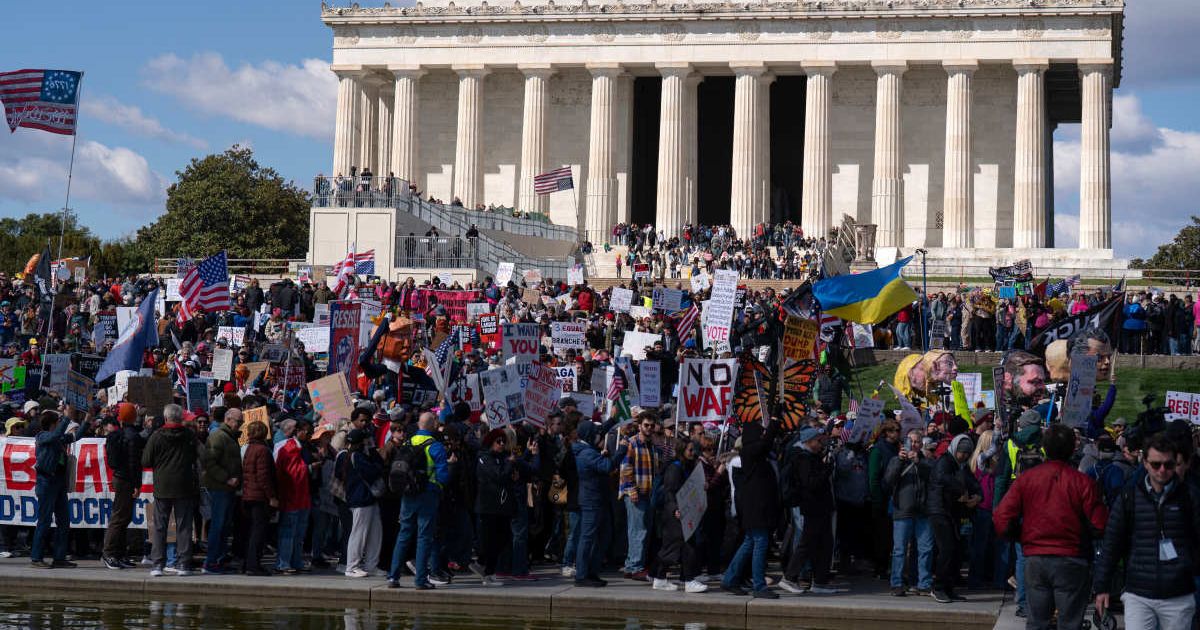 Demonstrators rally in front of the Lincoln Memorial during a ‘No Kings’ protest in Washington, Saturday, March 28, 2026 (AP Photo/Jose Luis Magana)