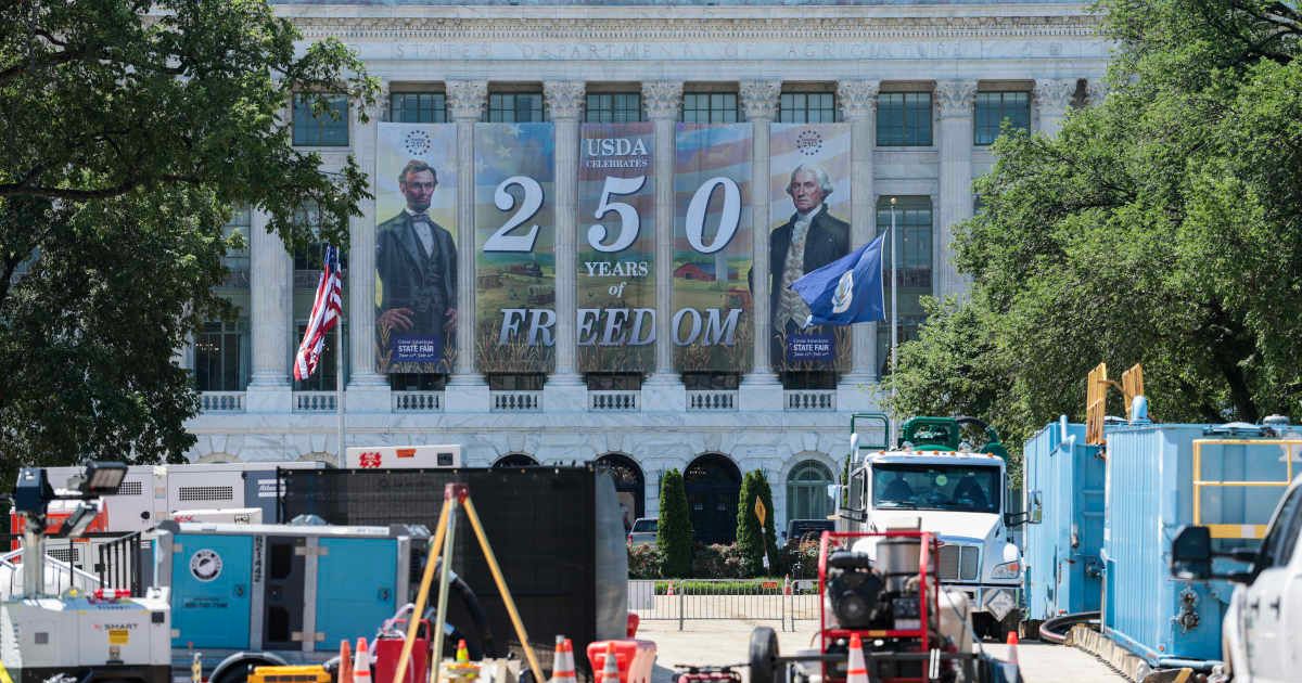 National Park Service crews continued stage construction on the National Mall on Friday despite the sudden loss of multiple headlining acts (Photo by Anna Moneymaker/Getty Images)