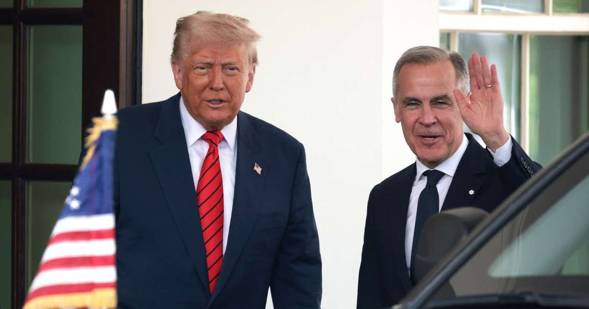 A viral rumor claimed Canada rejected a $573 billion railroad bailout request from Donald Trump amid ongoing US-Canada trade tensions (Alex Wong/Getty Images)