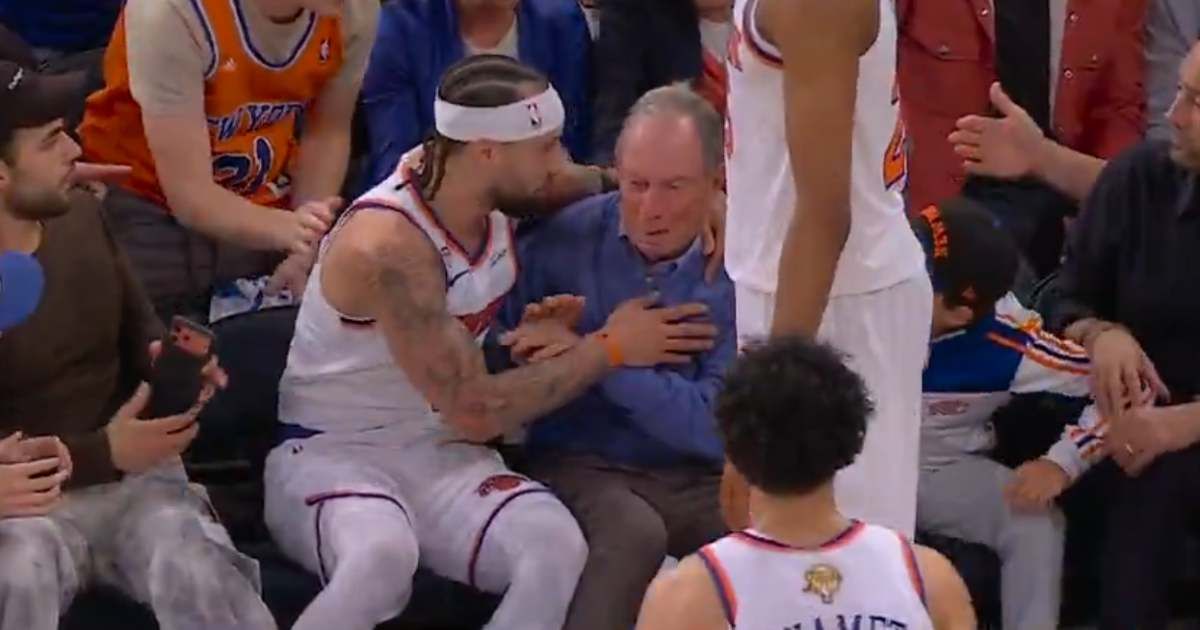 Jose Alvarado dove into courtside seats chasing a loose ball and landed in former New York City Mayor Michael Bloomberg's lap during Game 3 (@PatMcAfeeShow/X)