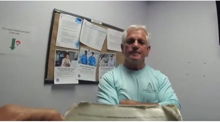 Nancy Guthrie case sheriff Chris Nanos caught with undeclared gun at airport, bodycam reveals