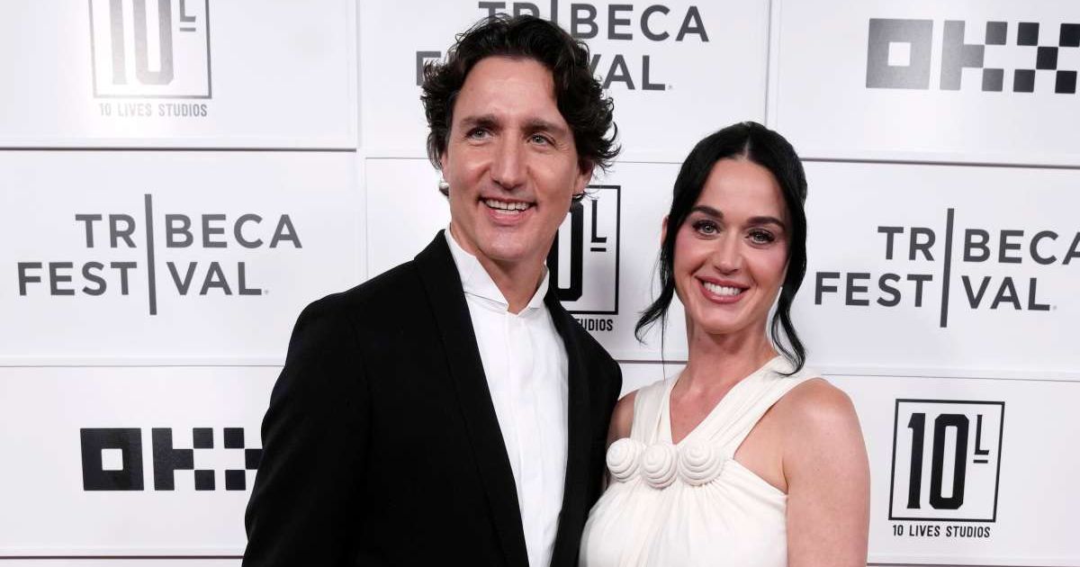 Justin Trudeau, left, and Katy Perry attend the "Katy Perry: The Lifetimes Tour - Live from Paris" world premiere at the OKX Theater at BMCC Tribeca Performing Arts Center during the Tribeca Festival on Monday, May 8, 2026, in New York. (Photo by Charles 