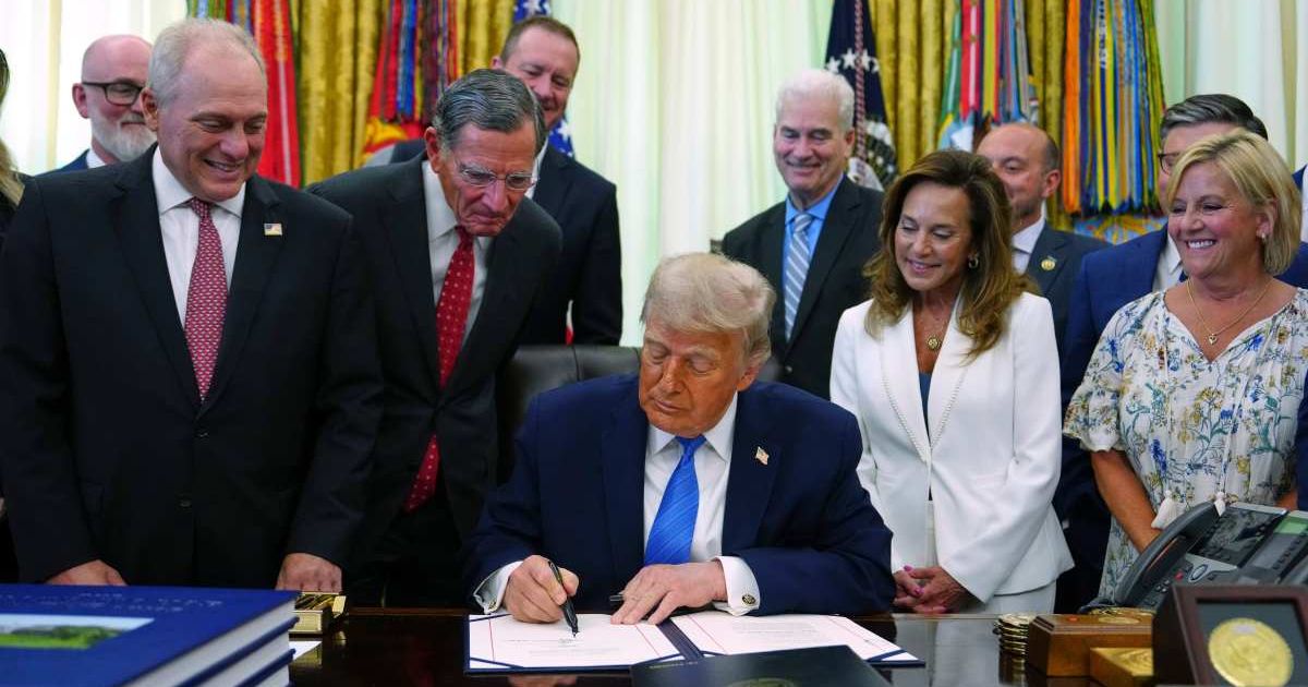 President Donald Trump signs legislation funding immigration enforcement in the Oval Office at the White House on June 10, 2026 (AP Photo/Julia Demaree Nikhinson)