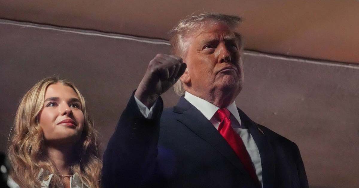 Donald Trump attends an NBA Finals playoff basketball game between the New York Knicks and the San Antonio Spurs at Madison Square Garden with Kai Trump (AP Photo/Mark Schiefelbein)