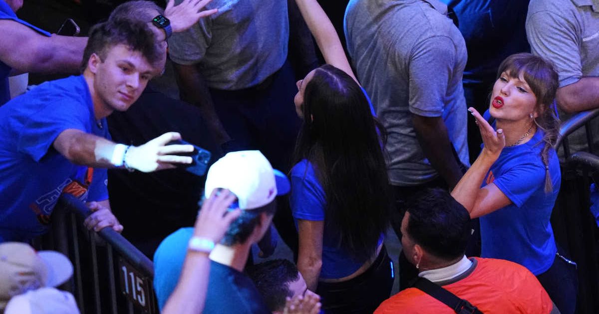 Taylor Swift blew a kiss to the crowd after her courtside appearance became part of a viral NBA Finals broadcast moment (AP Photo/Frank Franklin II)