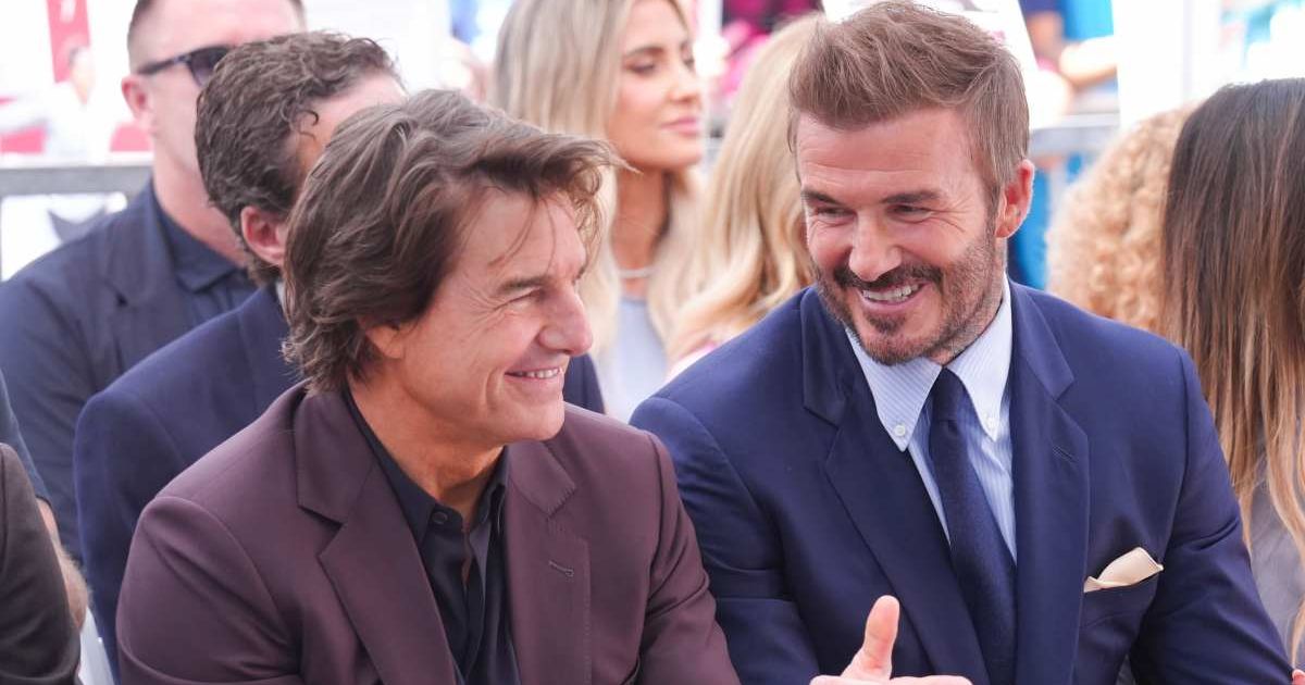 Tom Cruise and David Beckham attend a ceremony honoring David Beckham with a star on the Hollywood Walk of Fame (AP Photo/Chris Pizzello)