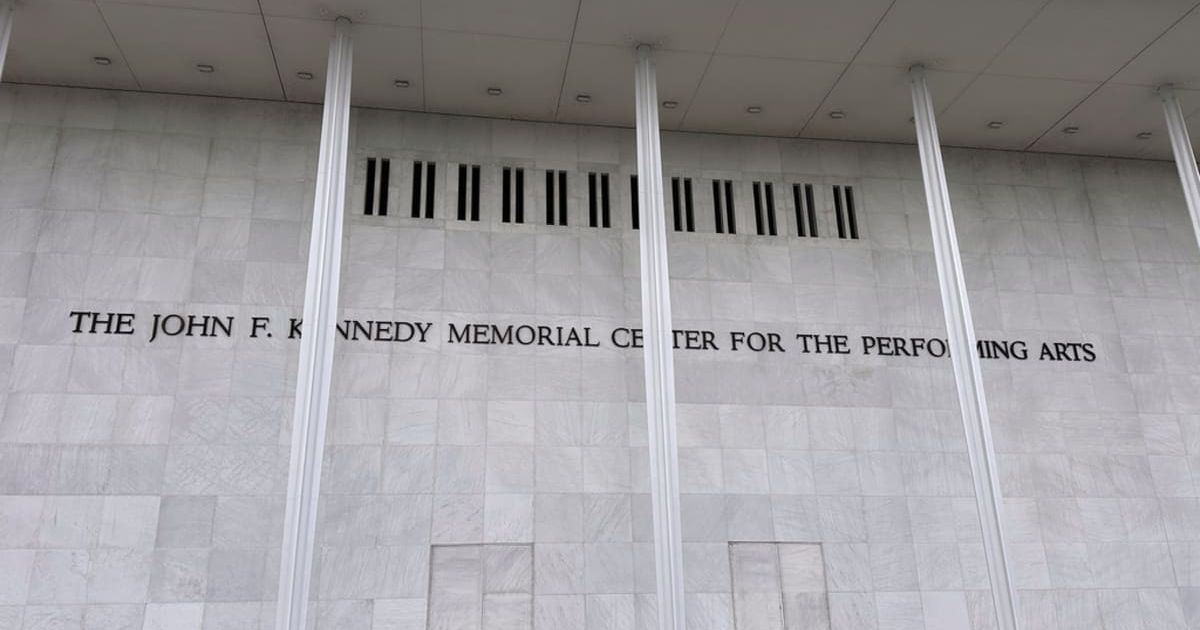 Onlookers gathered outside the Kennedy Center after a court rejected an emergency appeal seeking to keep Donald Trump's name on the venue (AP Photo/Rahmat Gul)