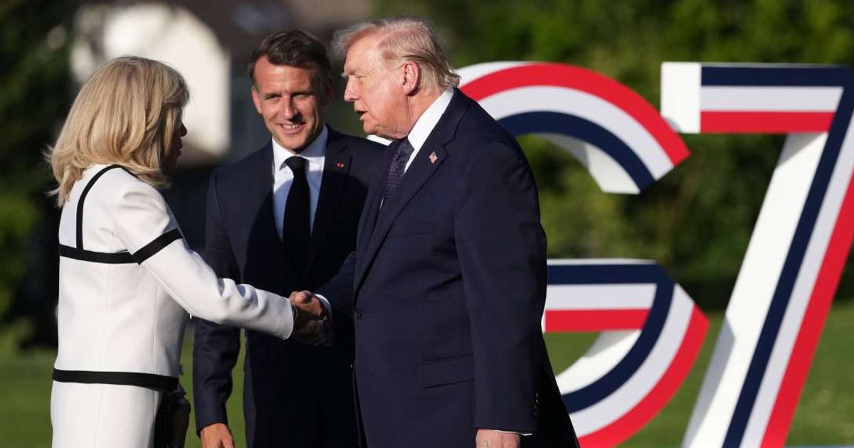 President Donald Trump greets Brigitte Macron during a G7 summit photo-op that later sparked discussion online (AP Photo/Thibault Camus)
