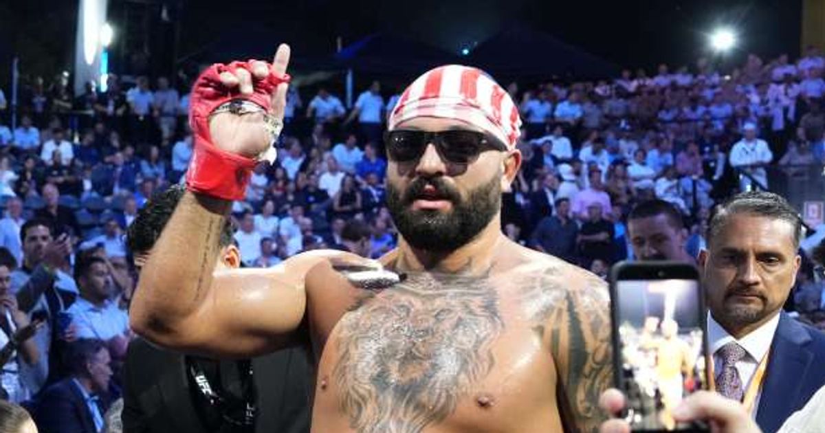Josh Hokit leaves the ring after winning his fight against Derrick Lewis in a heavyweight bout during UFC Freedom 250 on the South Lawn of the White House, Sunday, June 14, 2026, in Washington (AP Photo/Alex Brandon)