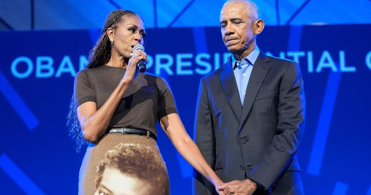 Michelle Obama honored Marian Robinson with a portrait on her skirt at the Obama Presidential Center event, leaving Barack Obama emotional (AP Photo/Pablo Martinez Monsivais, Pool)