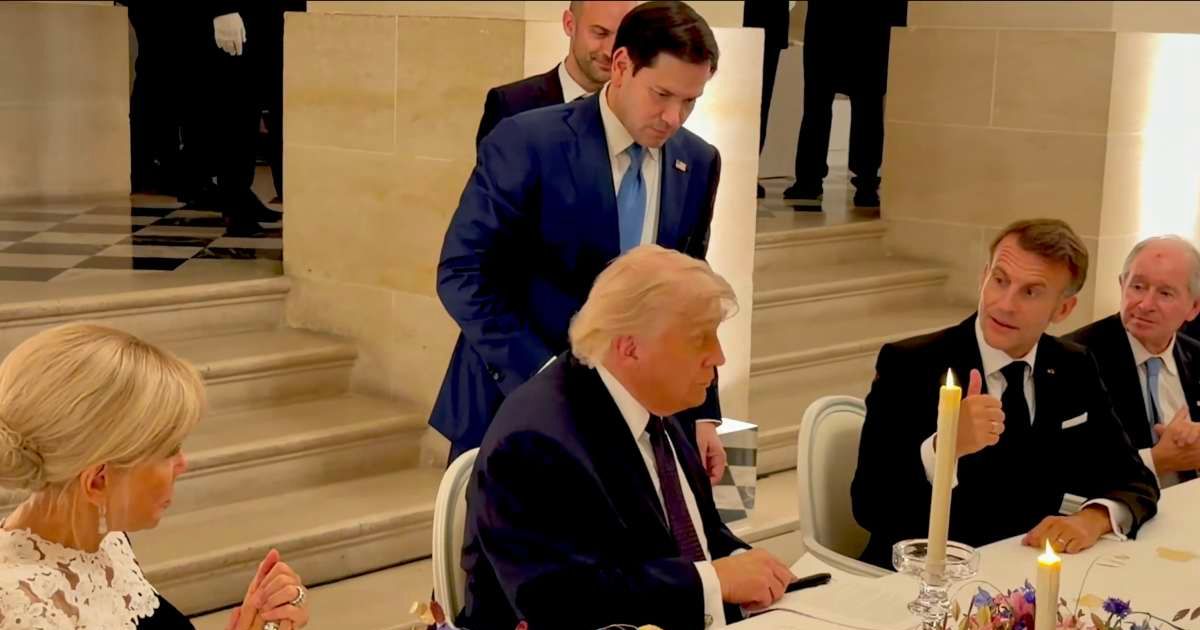 Video captures the moment President Trump signs the Iran MOU at Versailles as Secretary of State Marco Rubio presents the document and French President Emmanuel Macron applauds (X @Scavino47)