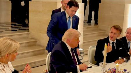 Moment Macron applauds as Rubio hands Trump the Iran MOU to sign at Versailles dinner
