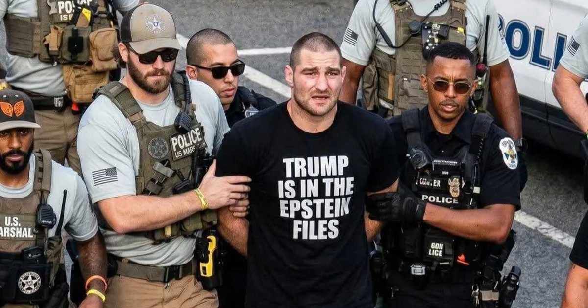 A viral image claimed Sean Strickland wore a T-shirt linking Donald Trump to Jeffrey Epstein during controversy surrounding a White House UFC event (@YourAnonNews/X)