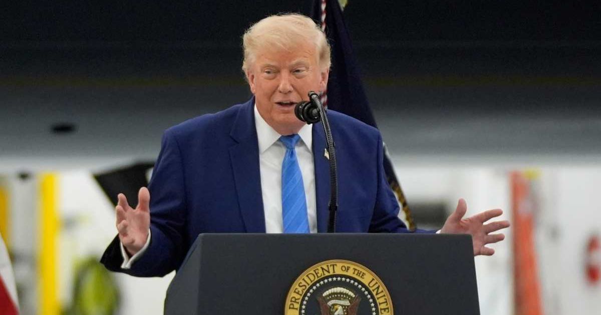 President Donald Trump mocked reporters during a luxury jet unveiling and joked that the aircraft finally made them smile (AP Photo/Manuel Balce Ceneta)