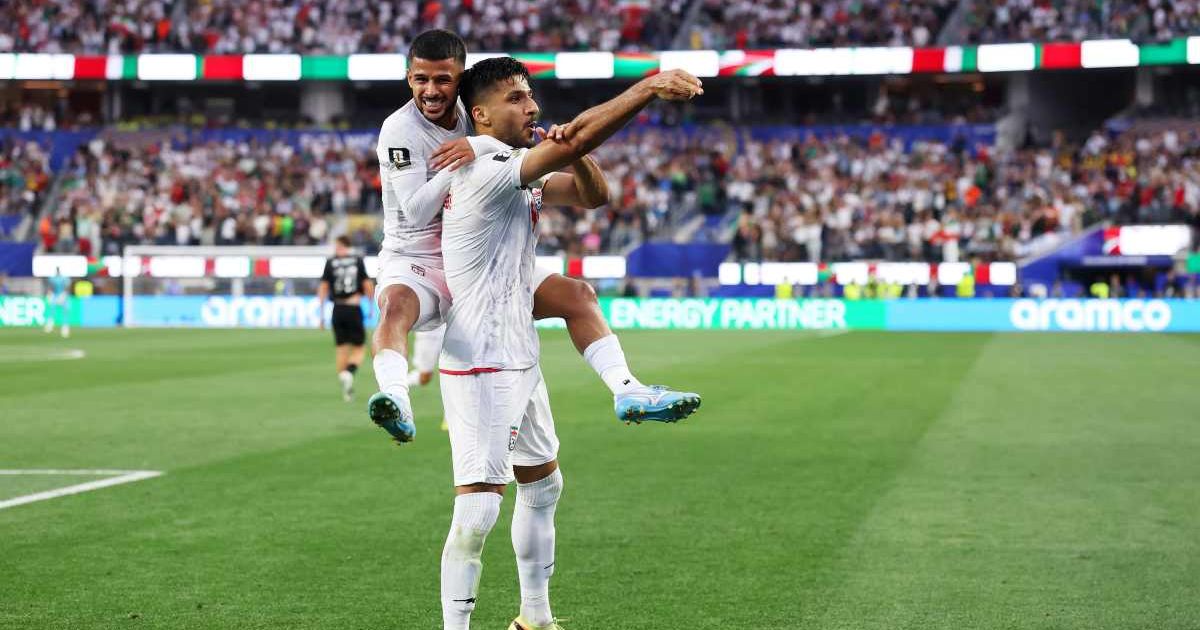 Mohammad Mohebbi #8 of IR Iran celebrates with teammate Mehdi Ghayedi #10 after scoring his team's second goal during the FIFA World Cup 2026 Group G match between IR Iran and New Zealand at Los Angeles Stadium on June 15, 2026, in Inglewood, California (