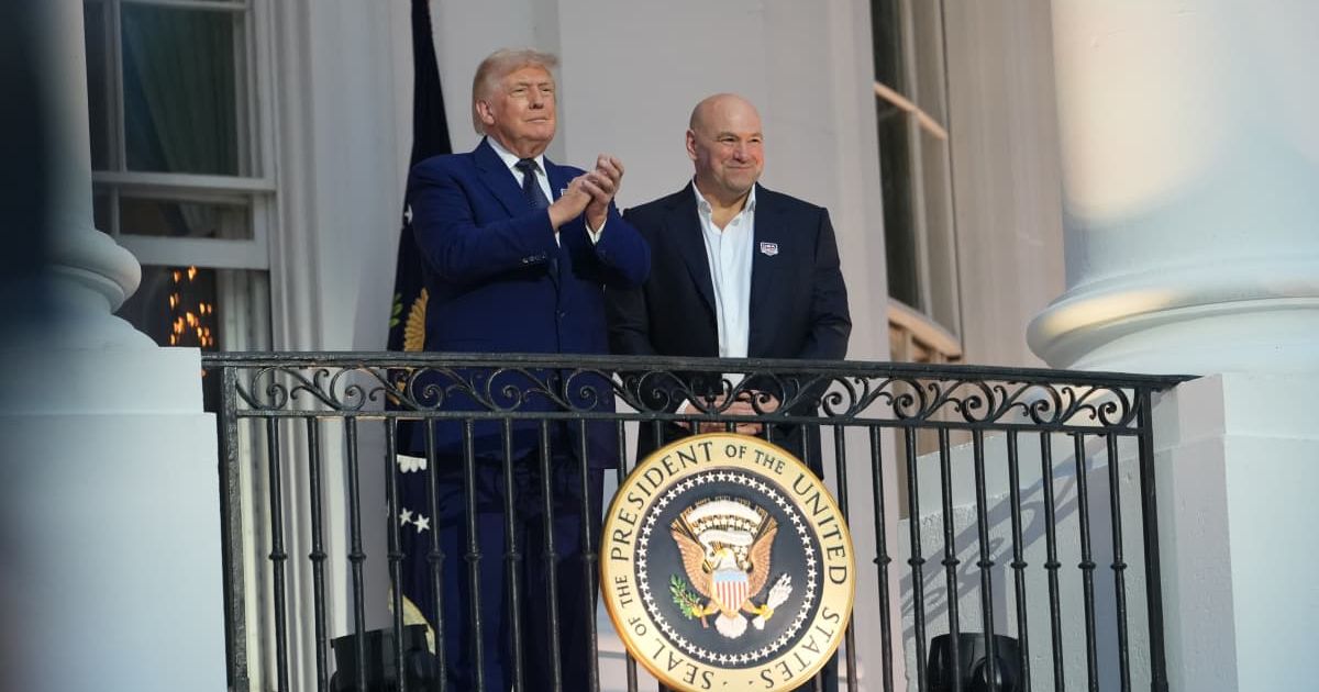 President Donald Trump and UFC President and CEO Dana White stand on White House Blue Room Balcony as they arrive at UFC Freedom 250 on the South Lawn of the White House, Sunday, June 14, 2026, in Washington (AP Photo/Julia Demaree Nikhinson)