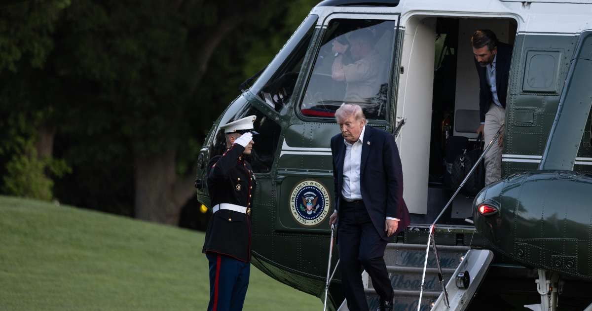 President Donald Trump, followed by son Donald Trump Jr, disembarks Marine One upon returning to the White House from Florida on May 3, 2026, in Washington, DC (Anna Rose Layden/Getty Images)