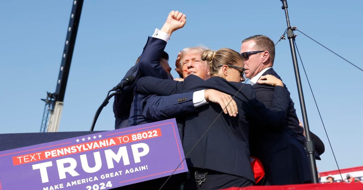 President Donald Trump is rushed offstage after being shot during a rally on July 13, 2024, in Butler, Pennsylvania (Getty Images)