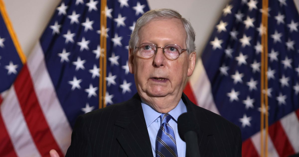 Republican Senator Mitch McConnell's hospitalization sparked viral social media claims that he was brain-dead, fueling speculation about his health  (Getty Images)