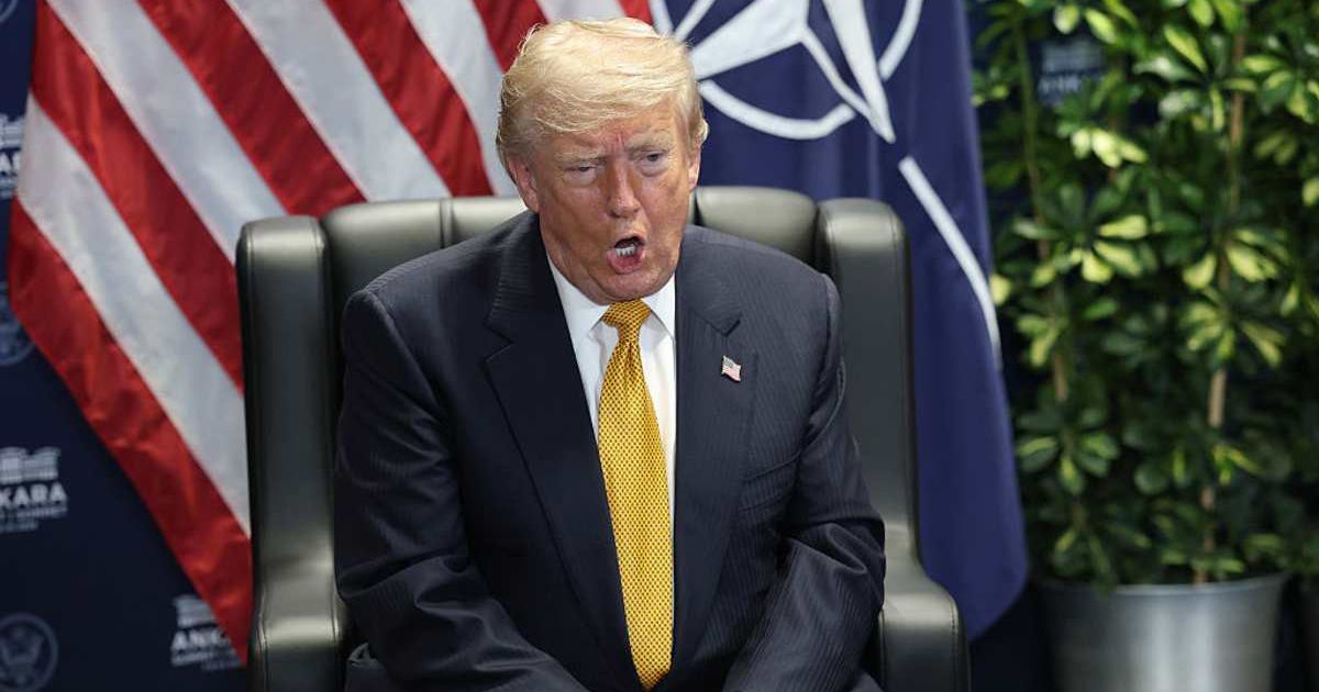President Donald Trump speaks with reporters in flight on Air Force One after landing at US Air Force Base at RAF Mildenhall, in Suffolk, Eastern England, Wednesday, July 8, 2026 (AP Photo/Alex Brandon)