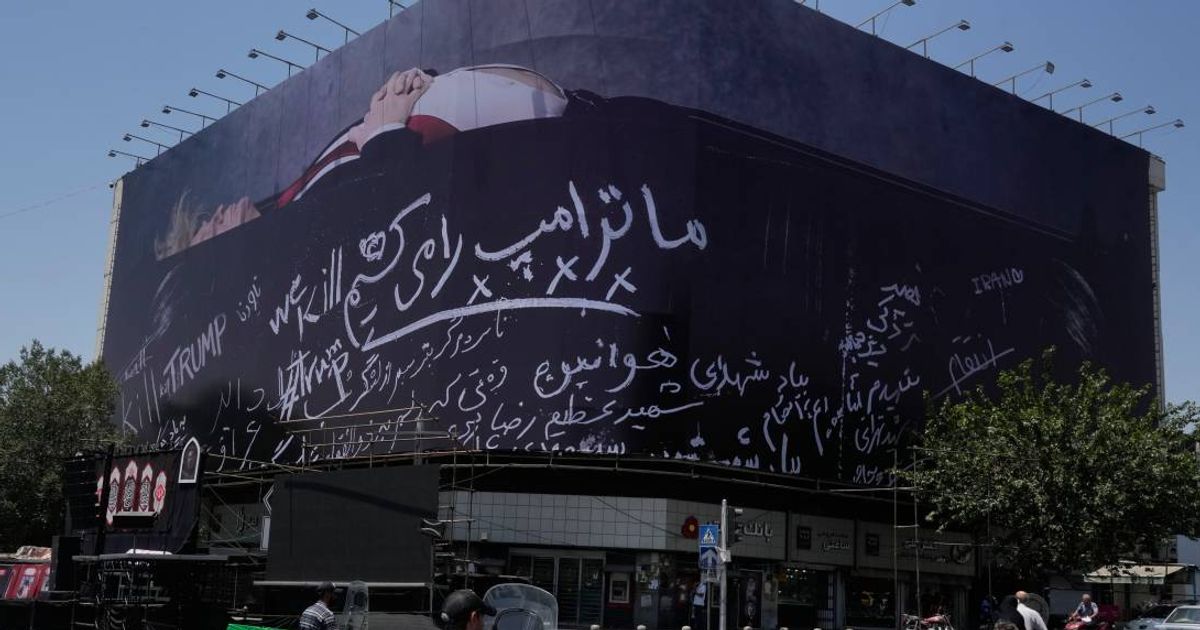 The billboard appeared in Tehran amid renewed US-Iran tensions, fueling widespread debate over its meaning online (AP Photo/Vahid Salemi)